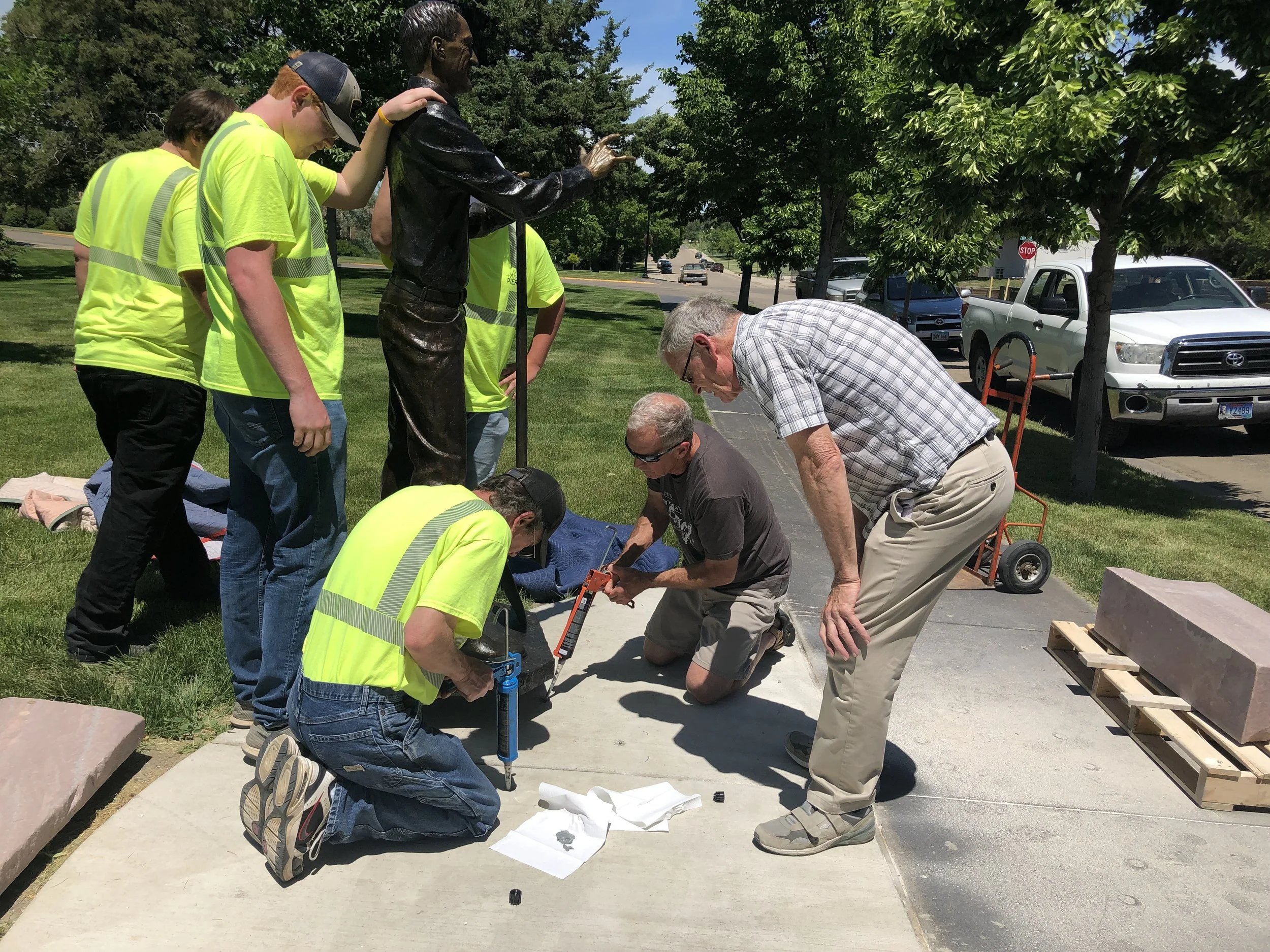 Chris Classen and the City of Pierre crew installing with me. Trail of Governors sachem Leroy Foster supervising.