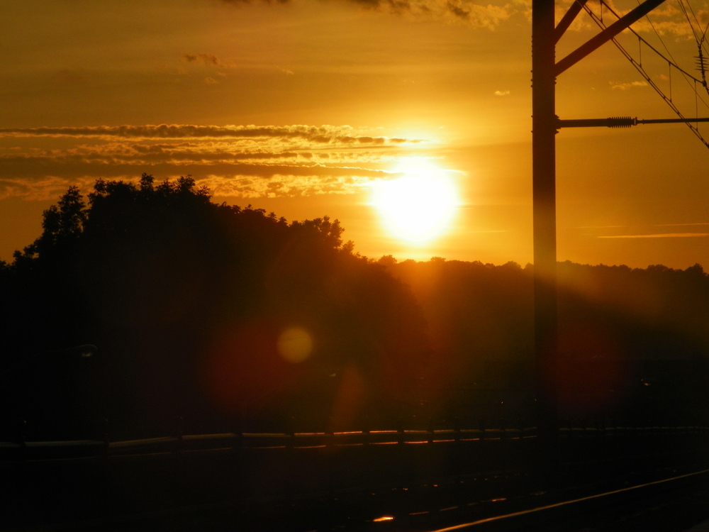    Sunset Behind the Tracks,&nbsp; Gamal Jones    Digital Photography, 8.5"x11"  