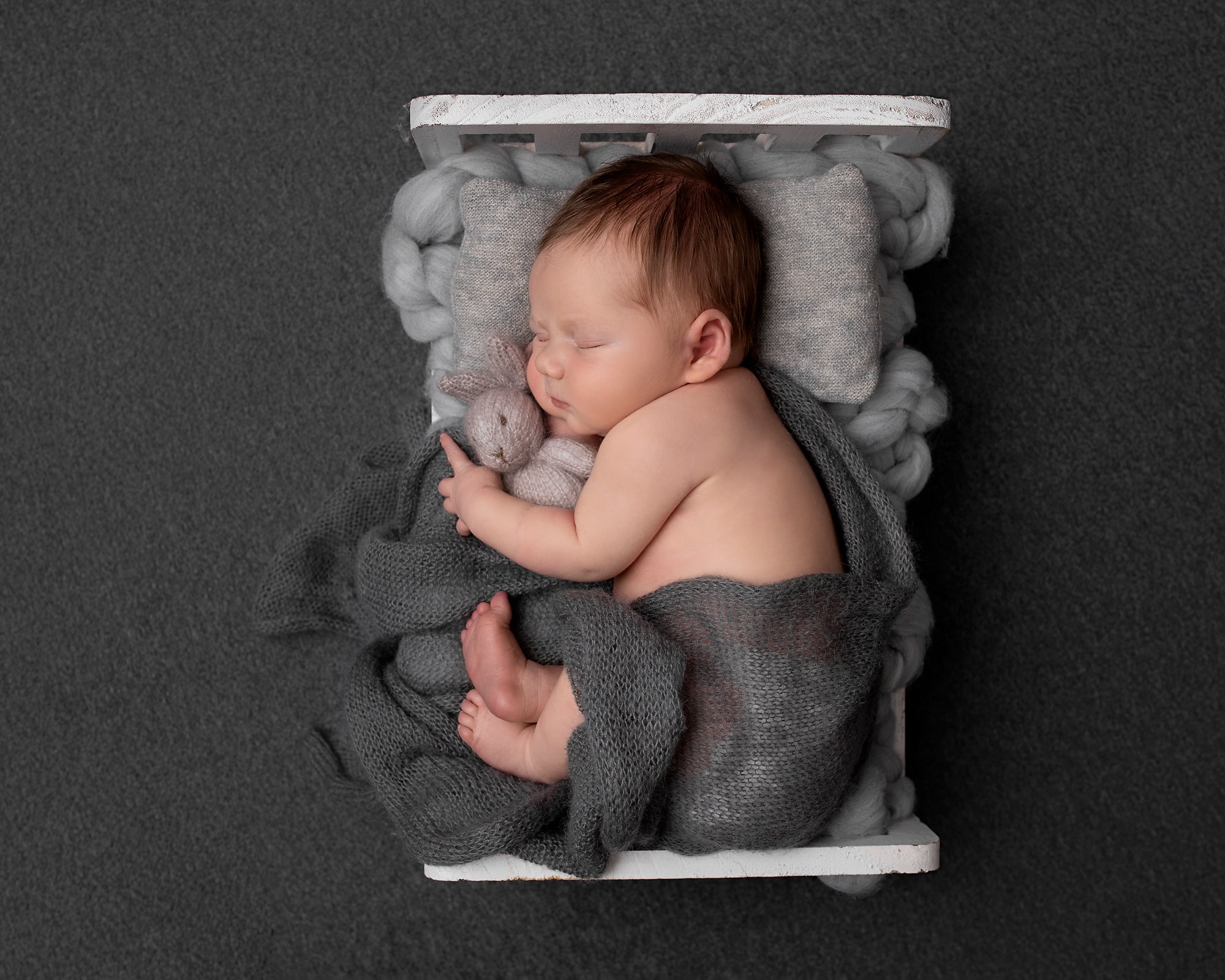 dark grey baby newborn bed