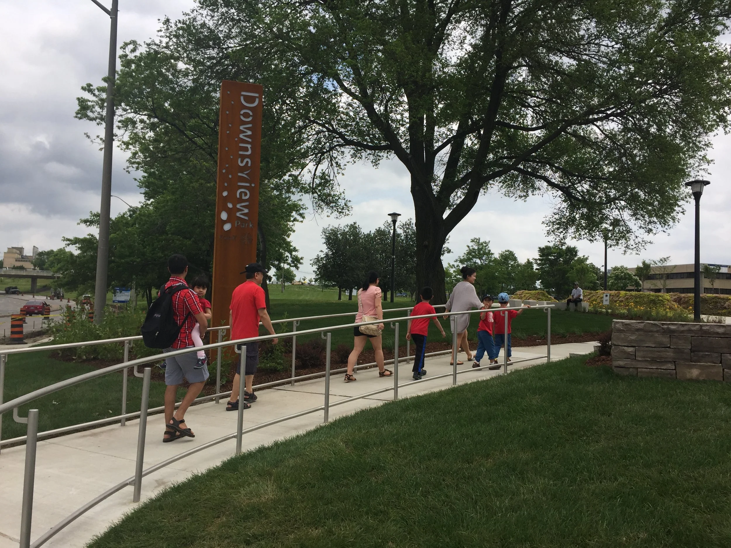  The pedestrian sized sign, seen here behind the ramp is also made of lazer-cut cor-ten steel. 