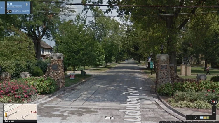 One of the large stone gateways marking the entrance to Audubon Park