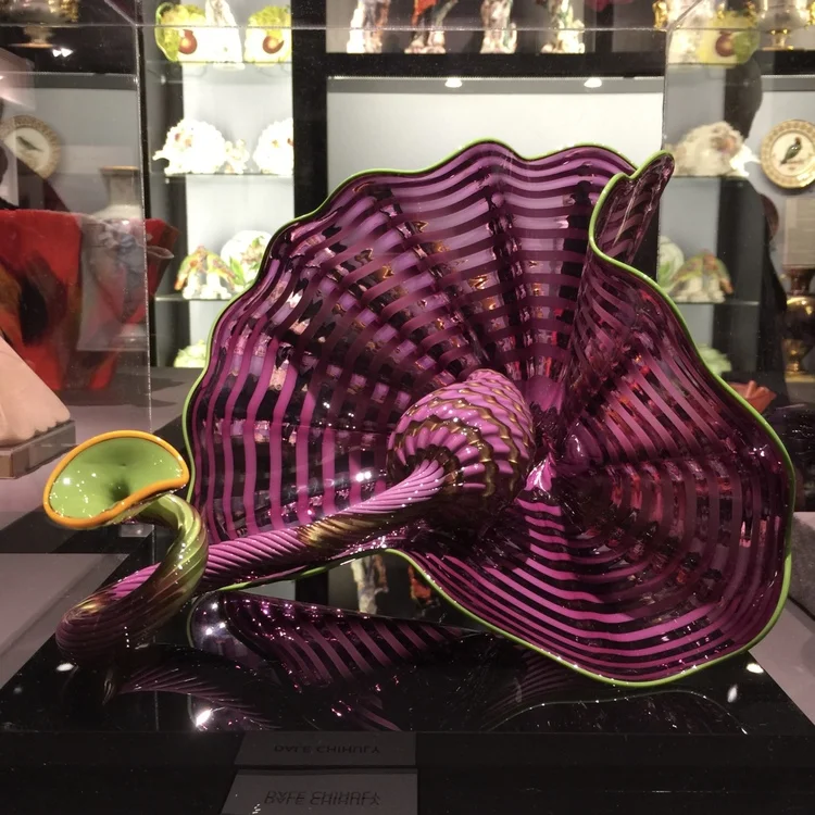 A colorful blown glass piece by Dale Chihuly evokes a tropical moment on a January afternoon.