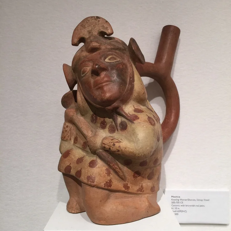 This ceramic kneeling warrior is actually a Pre-Columbian Mochica vessel available from Throckman Fine Art, Inc.