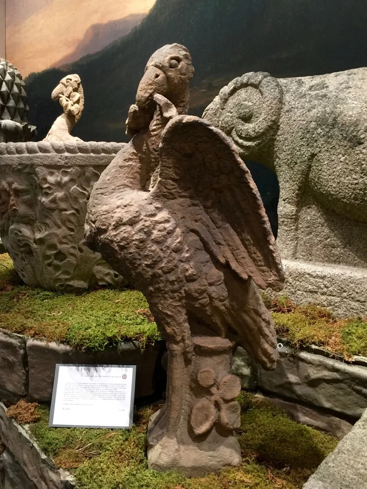 Barbara Israel Garden Antiques showcased a selection of carved sandstone garden ornaments, including this cormourant.