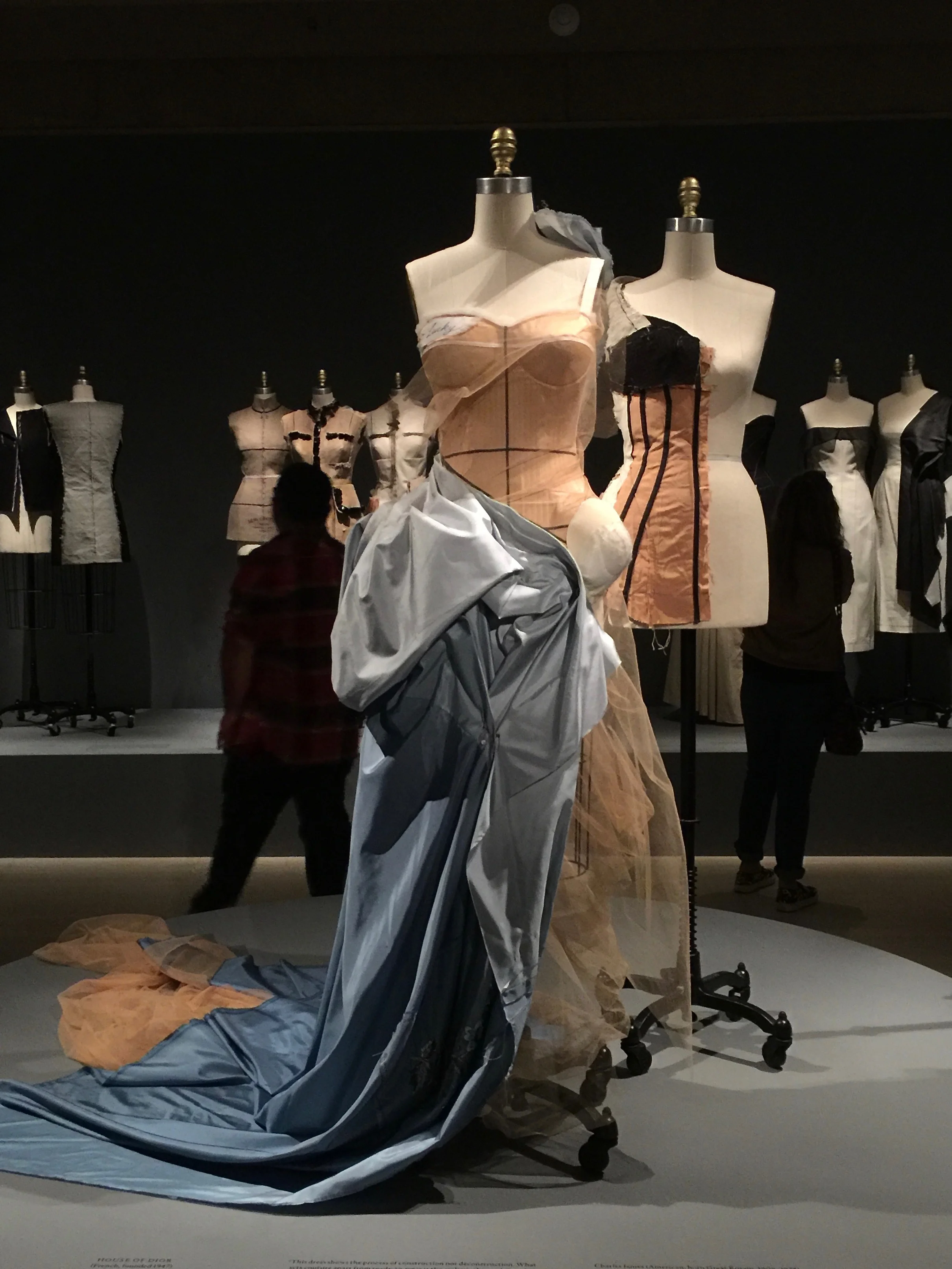 HOUSE OF DIOR, John Galliano ENSEMBLE, Autumn/Winter 2005-6, haute couture Machine-sewn nude silk satin, hand-stitched white polyester batting, hand-draped and hand-basted nude silk net and hand-pieced-dyed blue silk taffeta, hand-embroidered with clear glass beads, opalescent rhinestones, blue and ivory chenille, and silver metal cord and strips