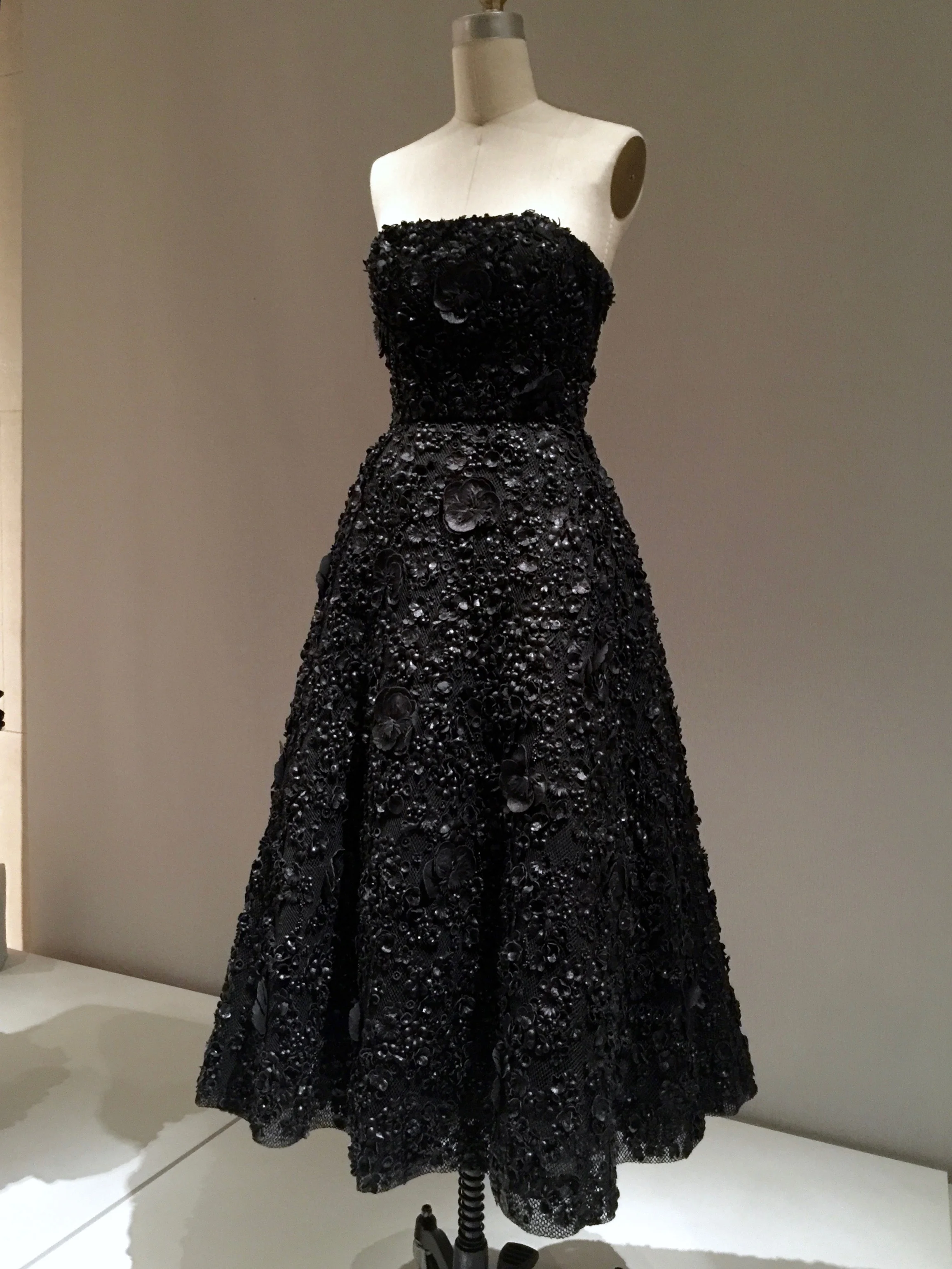 HOUSE OF DIOR, Raf Simons DRESS, Autumn/Winter 2013-14, pret-a-porter Machine-sewn black silk taffeta with overlay of black cotton-synthetic mesh, hand-embroidered with leather artificial flowers and black beads