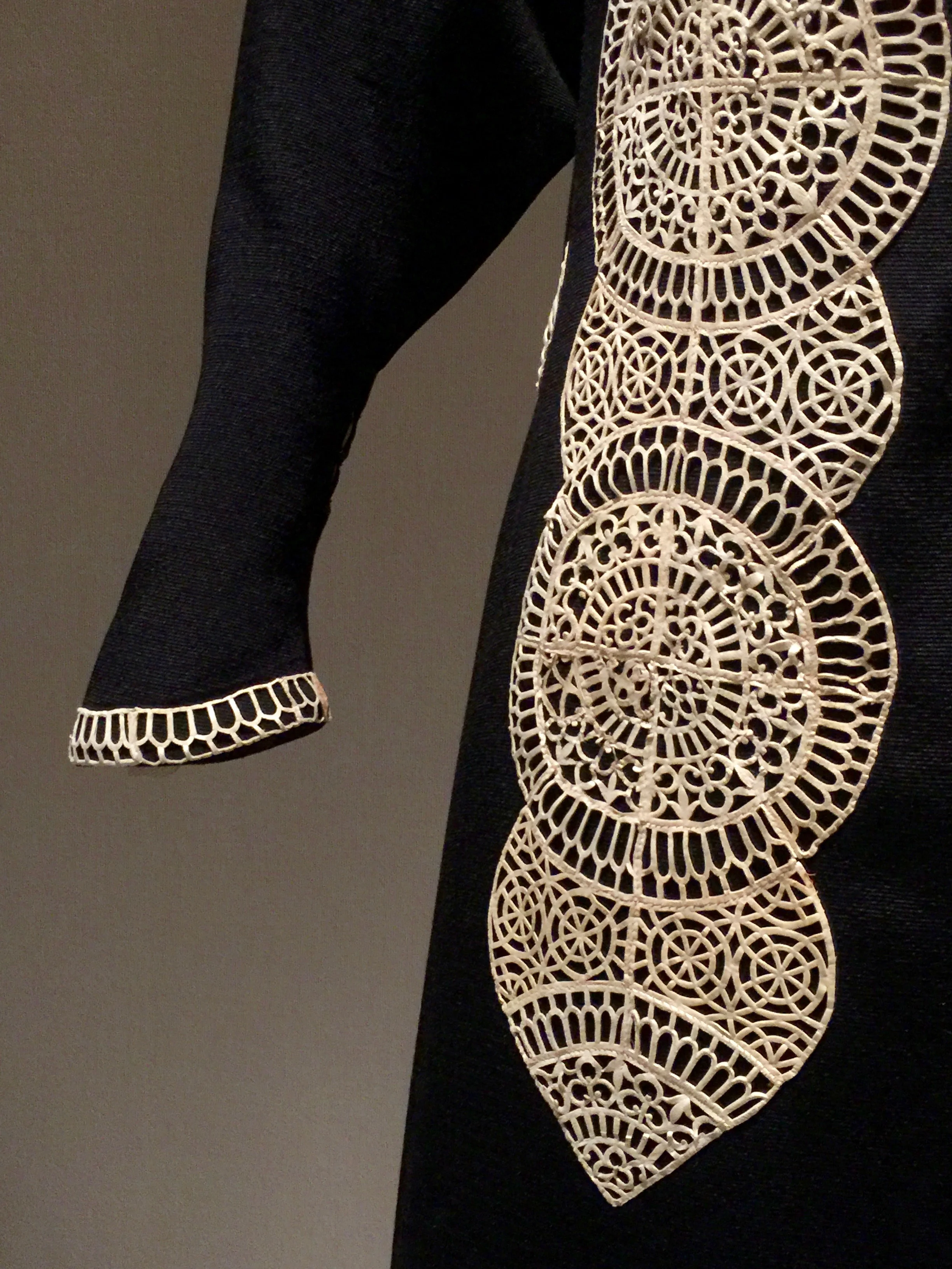 Detail of the white kidskin cutwork