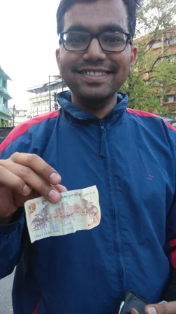 First Ngultrum received from an Indian Pan shop