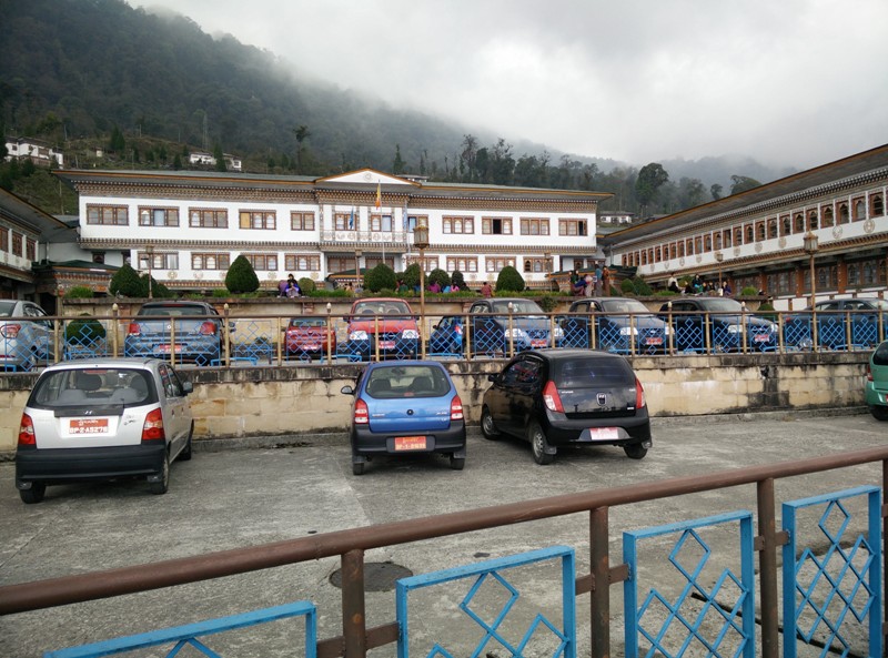 The Management College. people are just chilling outside