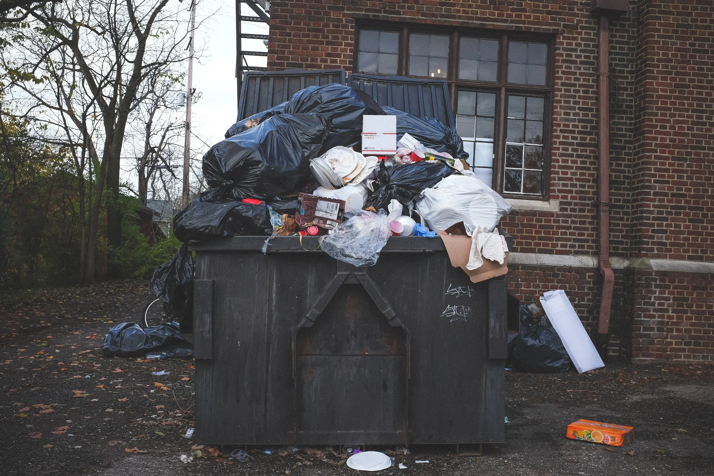 neonbrand_dumpster-trash-overflow_zerowaste.jpg