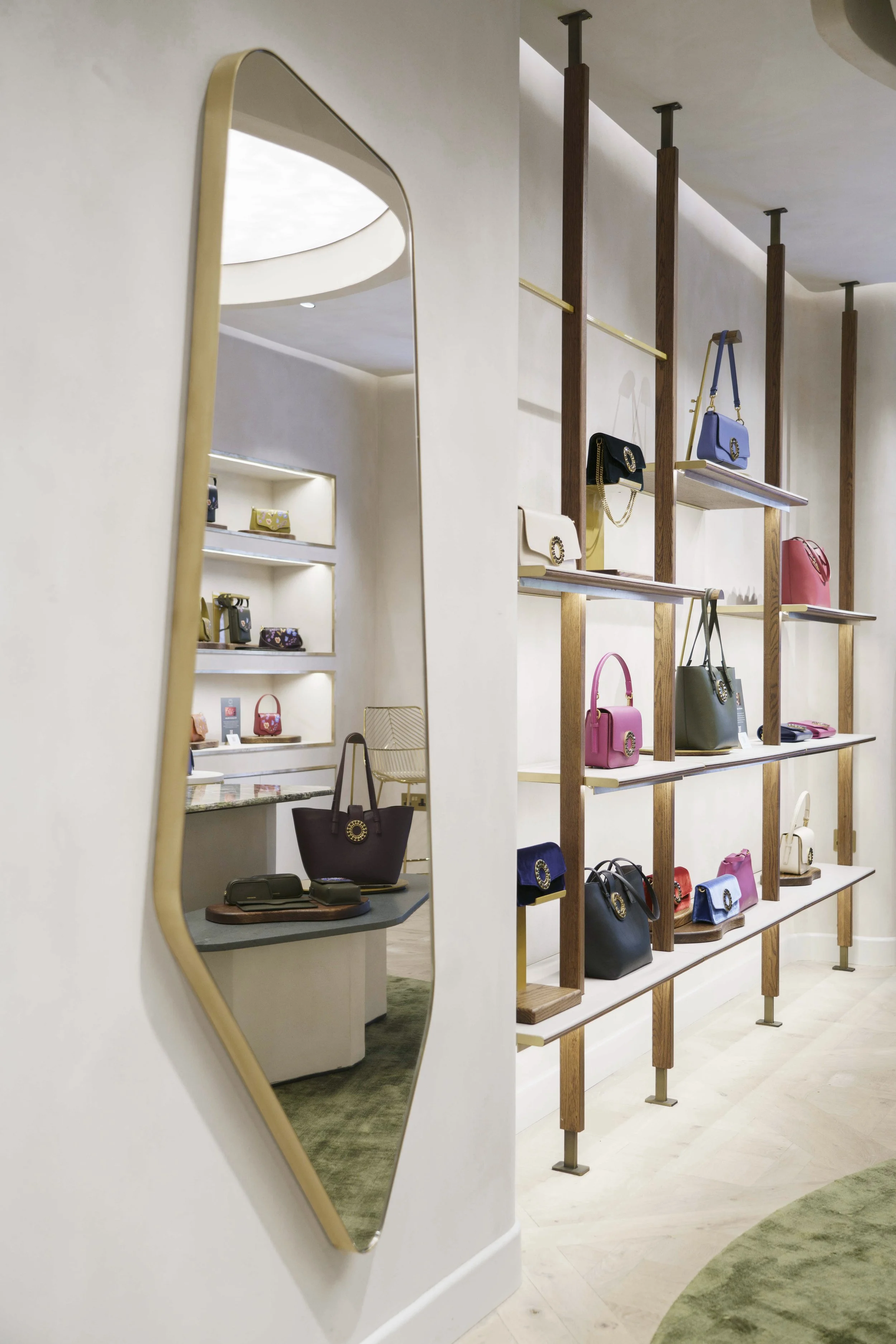Aranyani luxury retail interior design - ground floor airy pale cream interior portrait