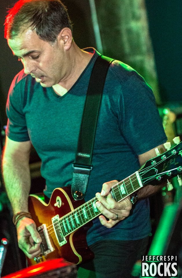 Jon Hakim | Guitar Jon Hakim is the guitar player for So Watt and is a founding member of the group. He has been strumming the guitar since his early teens and has been playing in various bands for over 25 years. Jon grew up in Ocean Township and studied mechanical engineering at the University of Maryland. He is a sales engineer by day, musician by night and soccer player on Sundays! Jon currently lives in the West Allenhurst section of Ocean Township with his wife Jennifer and their three children Brandon, Marissa and Jessica.