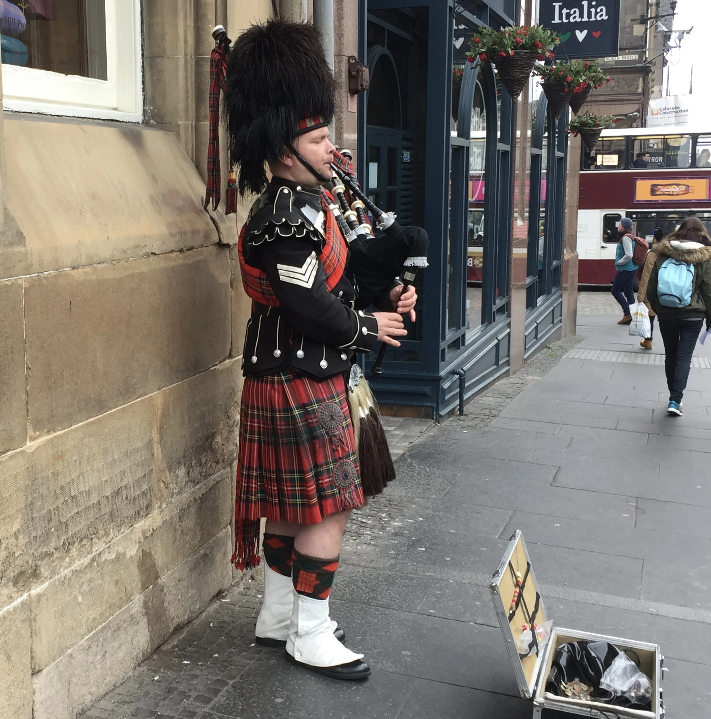 These bagpipe players work really hard. In a place that is even chillier than Amsterdam, they sport bare legs. You have to give them credit for giving the tourists what they want. 