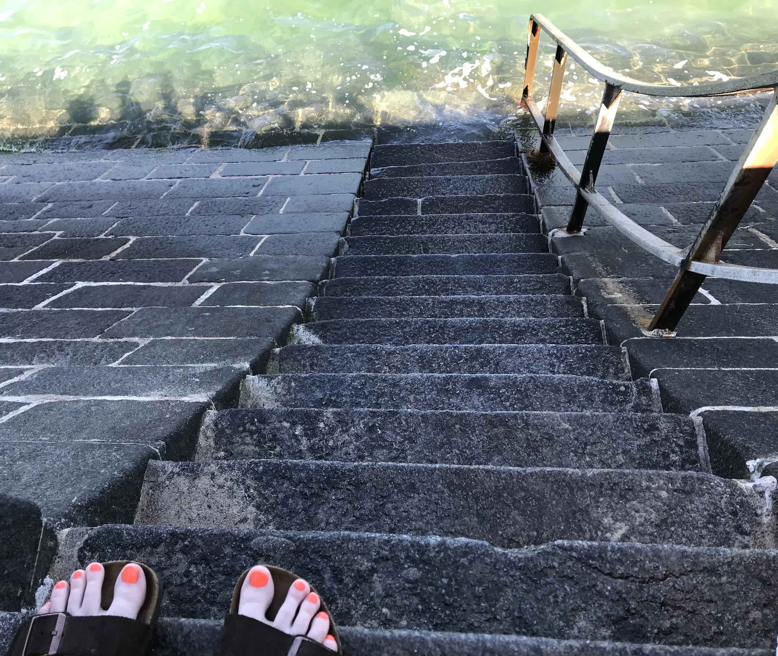 High tide. And the steps you had to climb down to reach the beach.&nbsp;