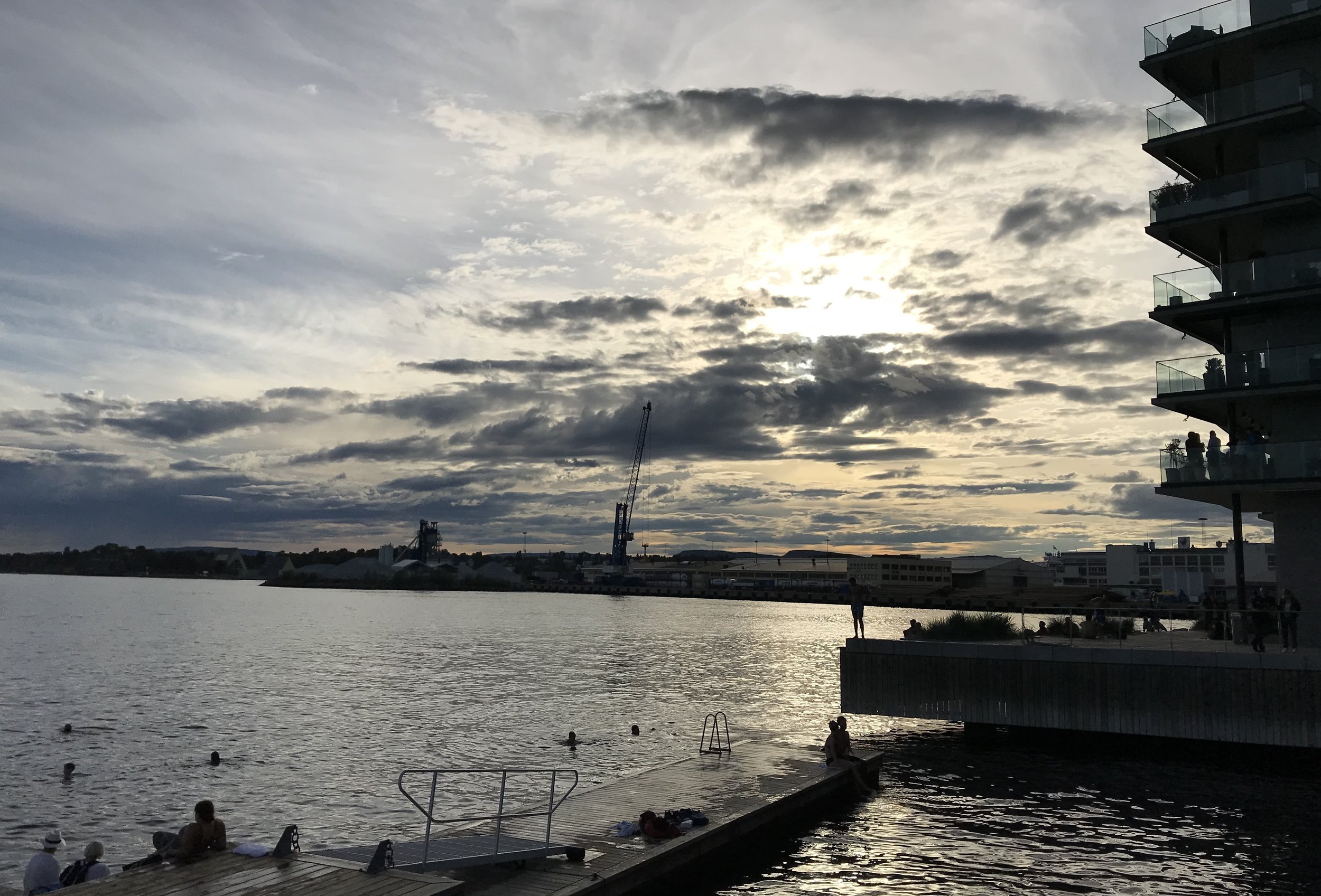  No such thing as global warming, you say? Oslo suffered through  record-breaking heat  this spring and summer. Luckily, they have that waterfront to jump into. Either these swimmers are a lot thicker-skinned than we are, or the water is a lot warmer