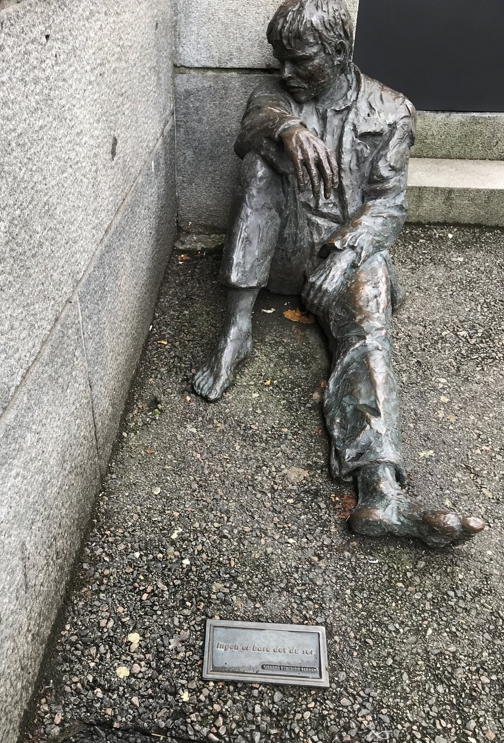  At first I wasn’t sure what I was looking at when we happened upon this statue. It is indeed a statue of a homeless man, and allegedly the  most photographed statue in Bergen  (although I’m not sure how you would measure that). The plaque in front s