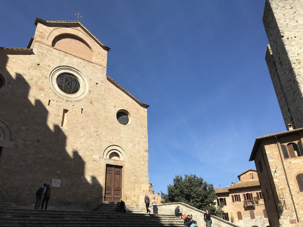  You can tell it’s early morning in San Gimignano because of the scant numbers on the steps of the church in the piazza. 