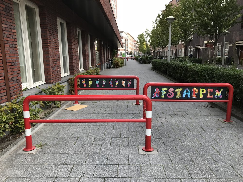  This colorful sign telling you to, “Get Off Your Bike” is also in  De Baarsjes . I assume the Dutch ignore it just like they do the more mundane ones in our neighborhood. 