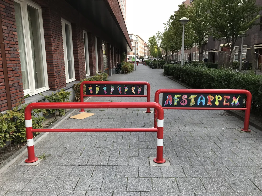  This colorful sign telling you to, “Get Off Your Bike” is also in  De Baarsjes . I assume the Dutch ignore it just like they do the more mundane ones in our neighborhood. 