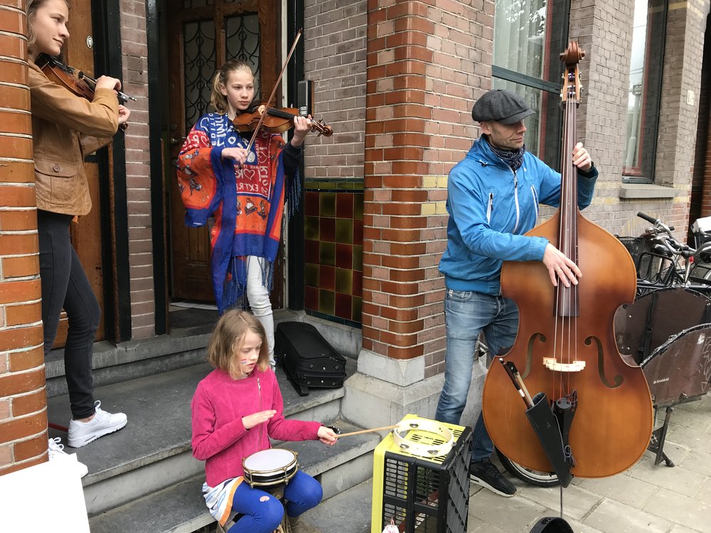  My favorite part of King’s Day is the music, played mostly by kids. They earn a lot of coins for their efforts.   