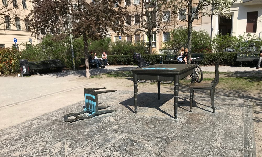  This memorial - in the middle of a neighborhood - is very powerful. It was designed to show how ordinary Germans had to have known their Jewish neighbors were being taken away. It represents how Jews had to leave in a hurry and the violence of their