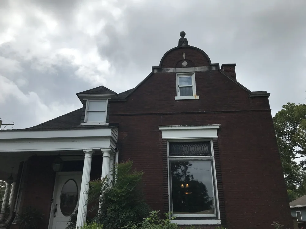  Thankfully, no one was home at this house to see me snapping away. The top of the house reminded me of the gables at the top of the Amsterdam canal houses. This house is considered old in Nashville, but in Amsterdam, it would be just a teenager. 