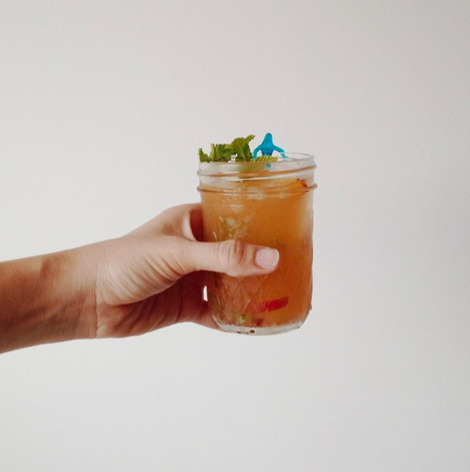 1 oz gin + 1/2 oz st Germaine + 2 dashes of orange bitters + soda water. Stirred with fresh peach + spearmint + 1/2 squeezed lime juice purée. Strain into chilled glass, garnish with mint + peach slices + a little mermaid.