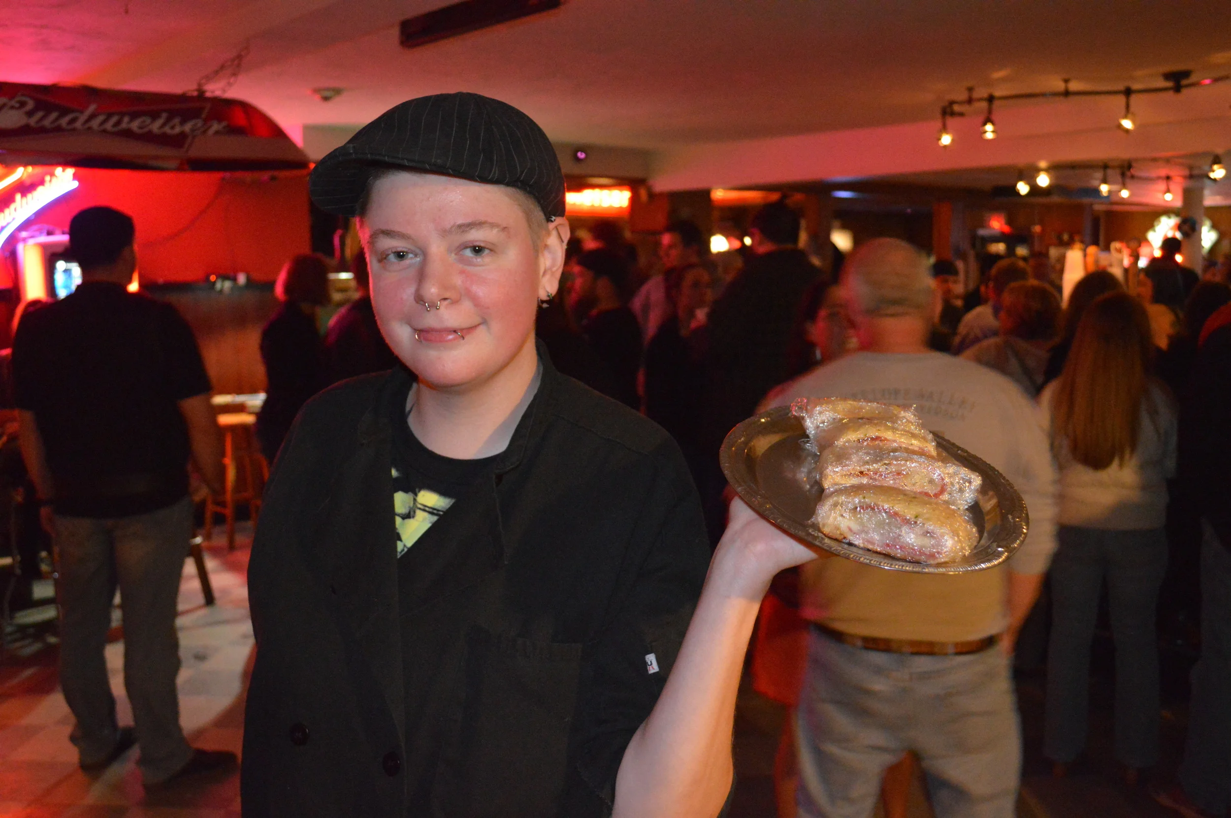 One of our amazing chefs Erin bringing strombolis to the masses!