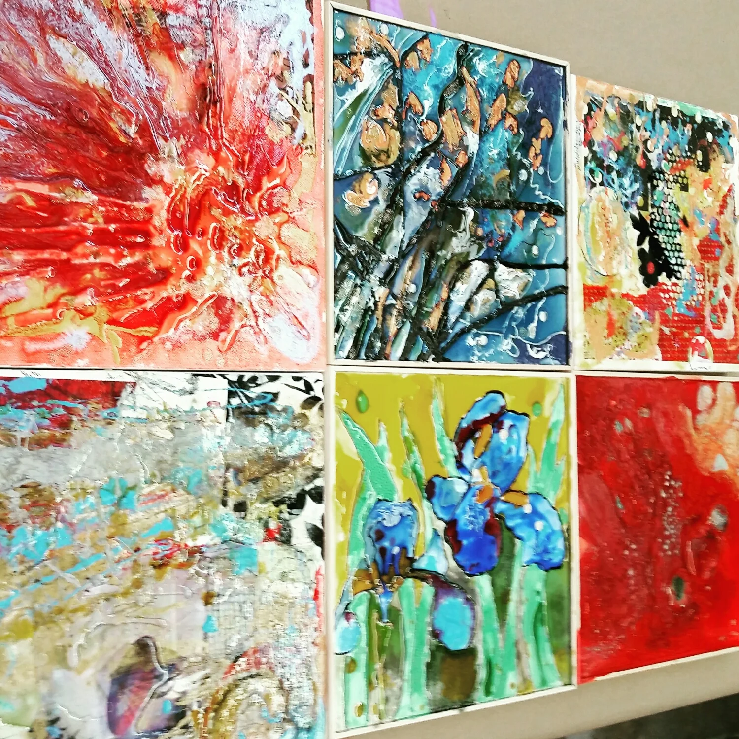 Paintings on canvas and liquid art panels.