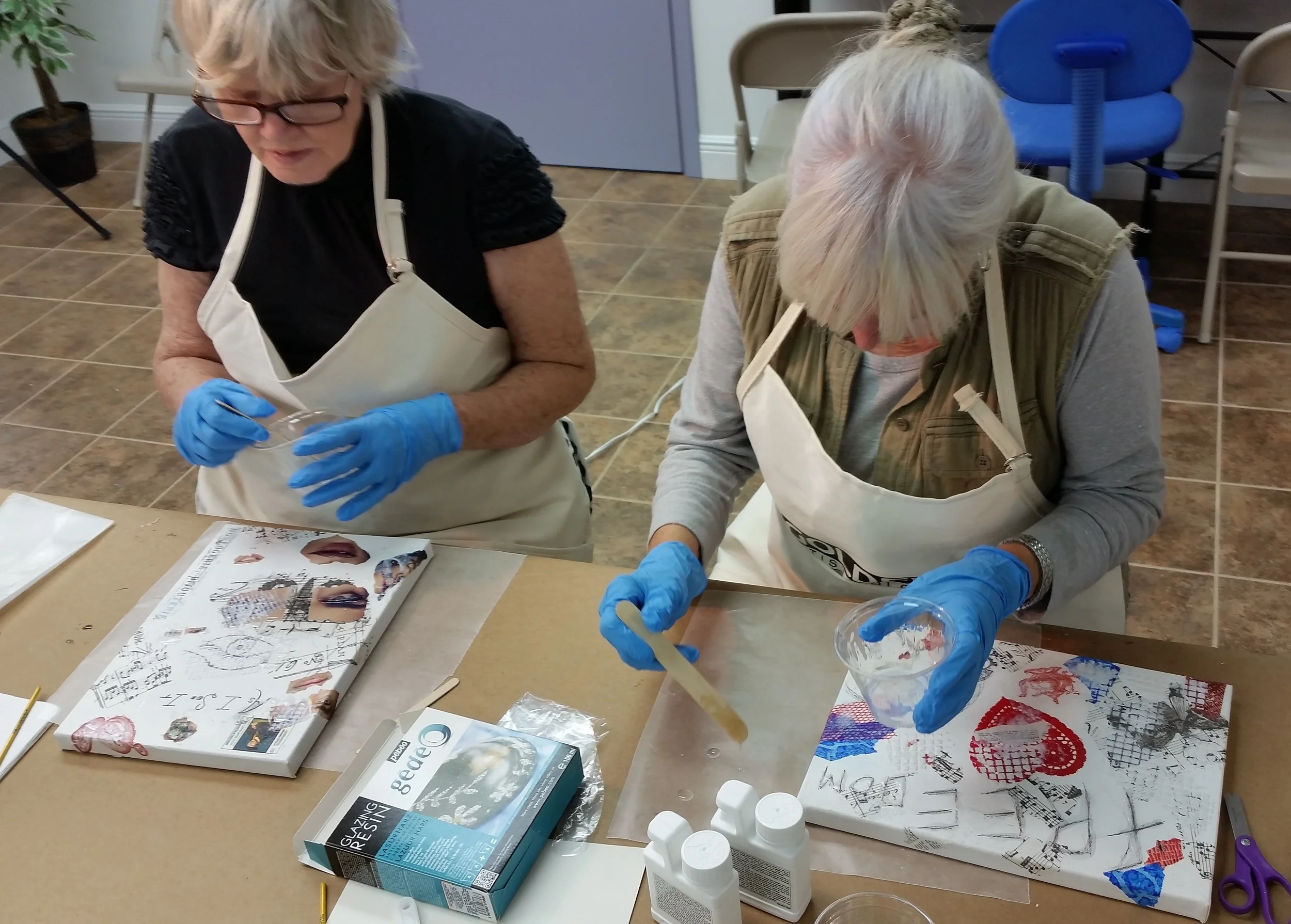 Enhancing the collage with Glazing Resin and making resin "bubbles".