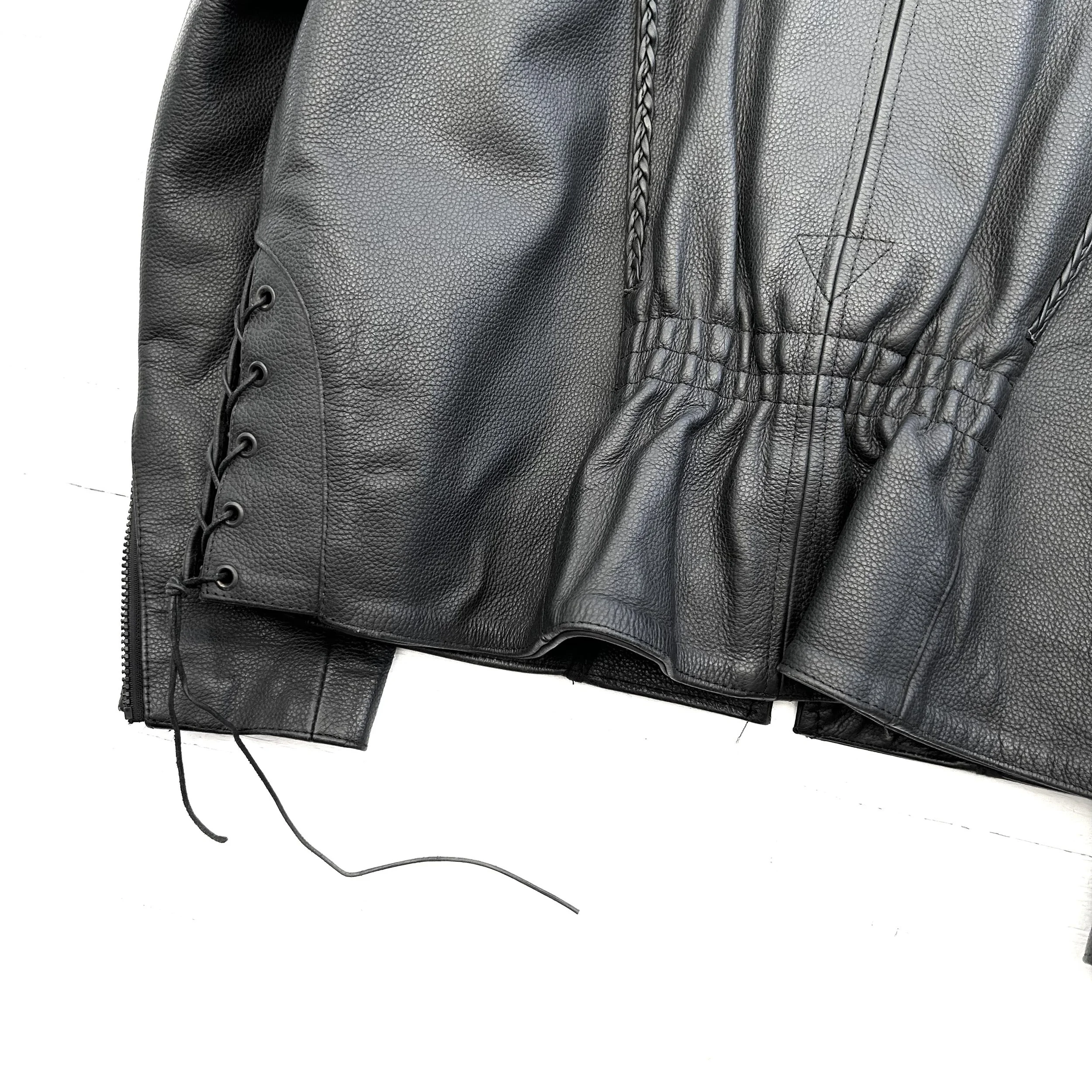 BLACK LEATHER JACKET BACK DETAIL.jpg