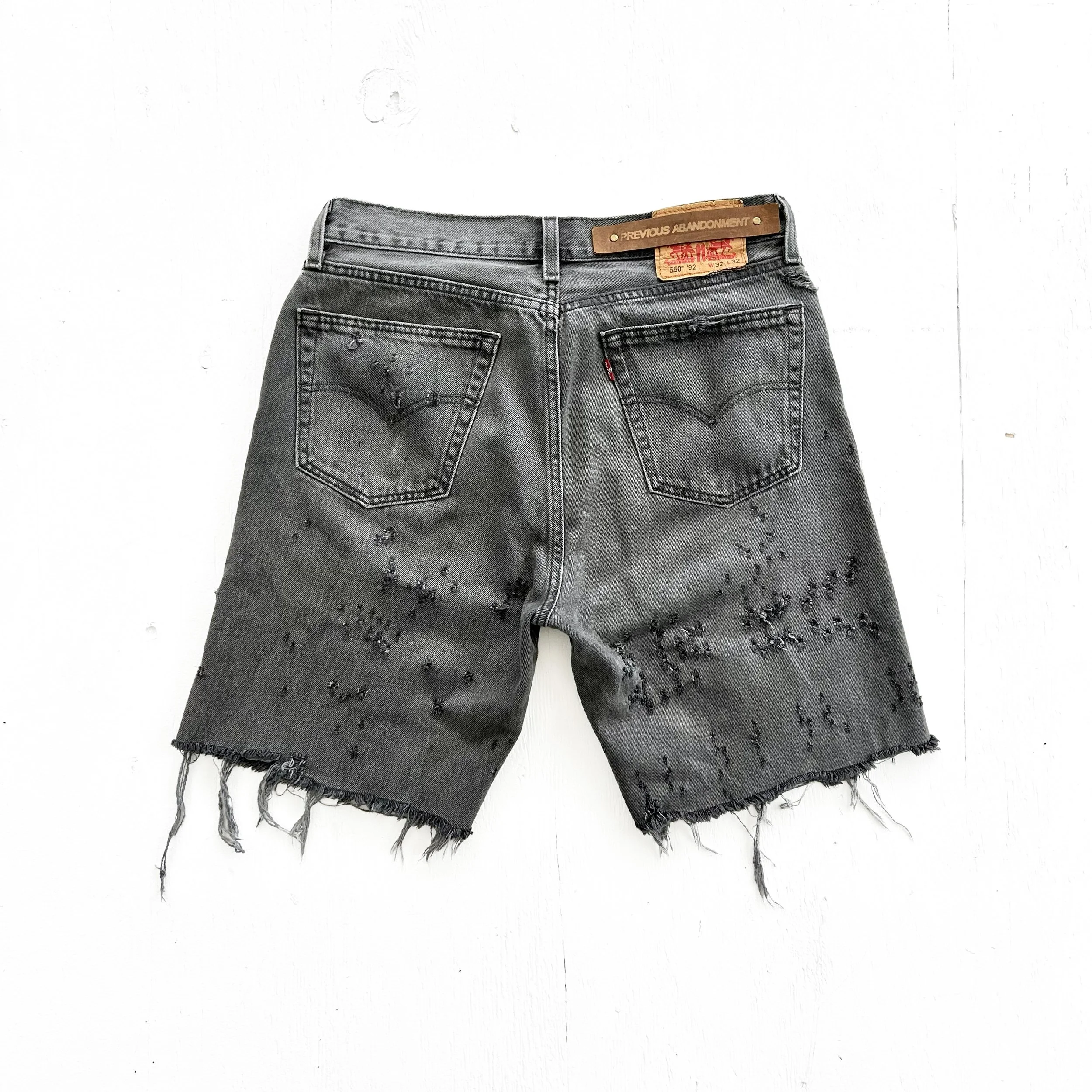 bullet hole jorts back.jpg