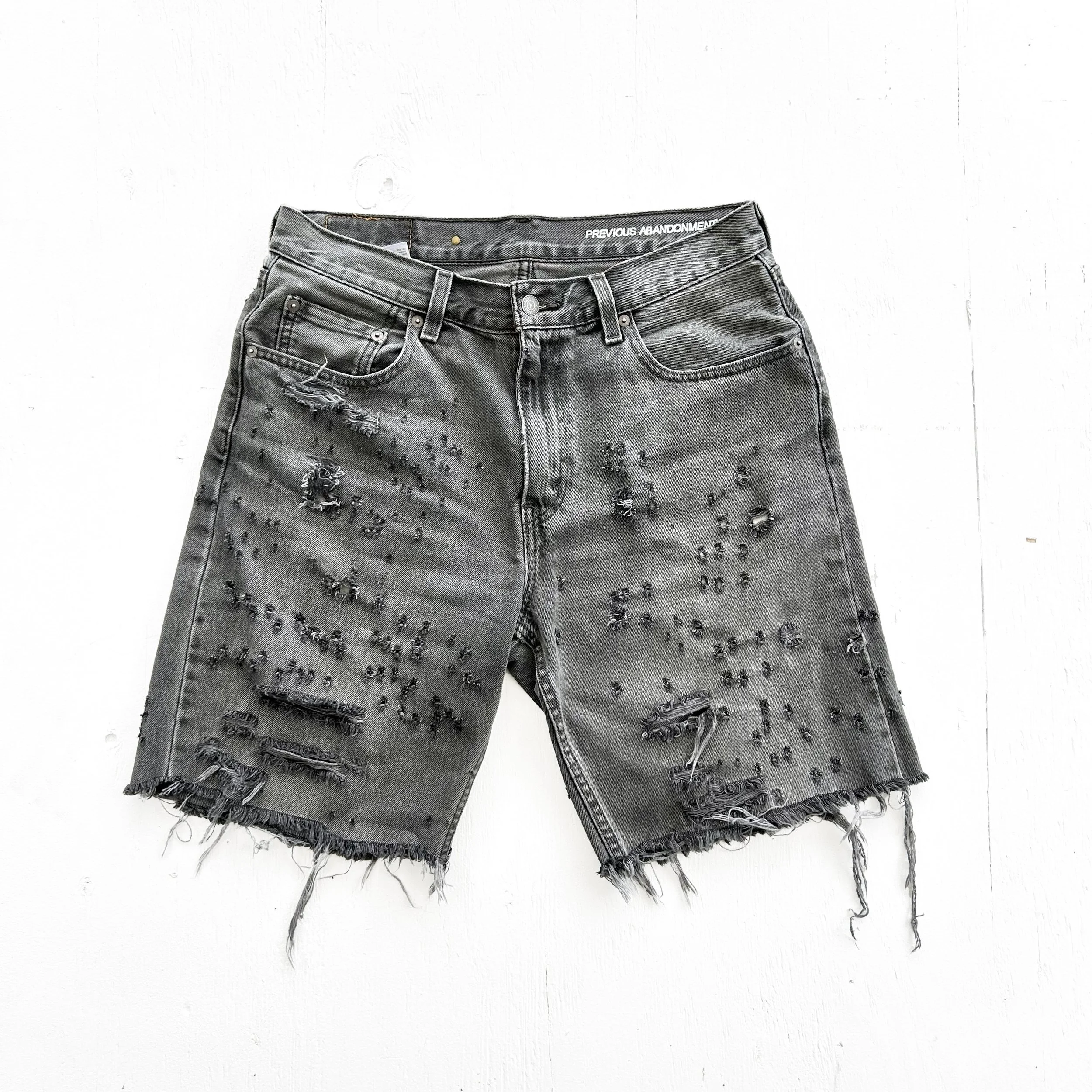 bullet hole jorts frt.jpg