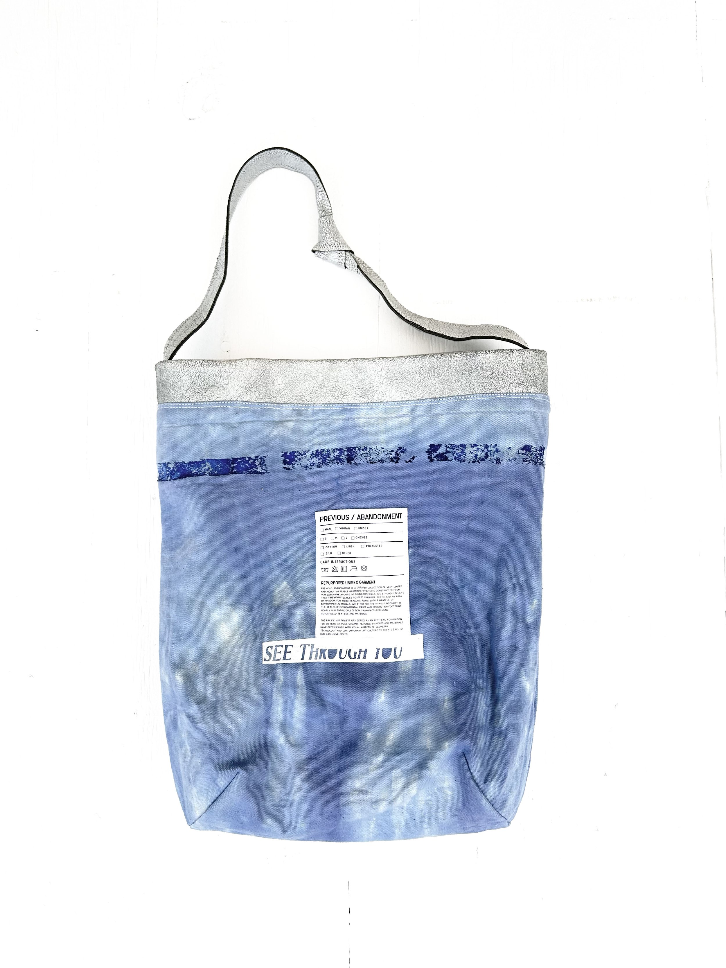 white cracked leather knot tote interior.jpg