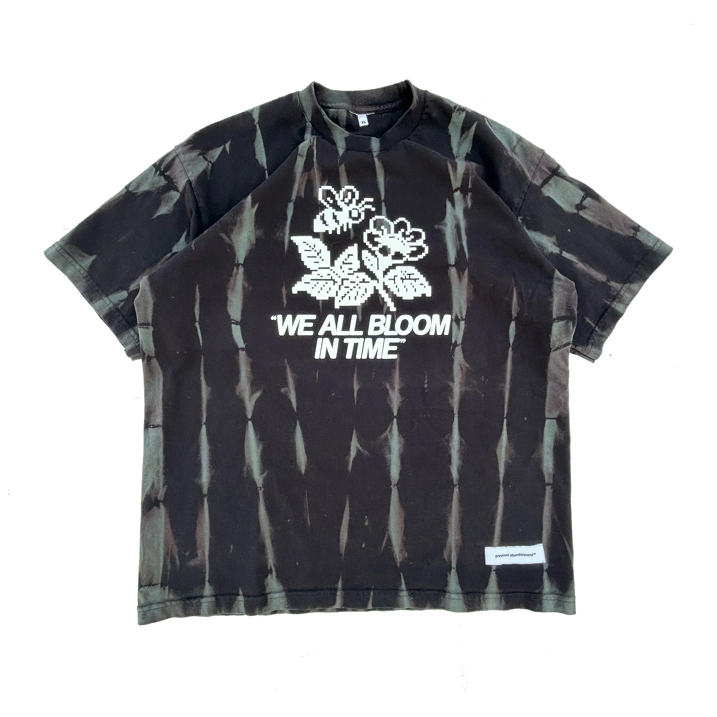 WE ALL BLOOM IN TIME PUFF TEE BLACK FRONT REAL.jpg