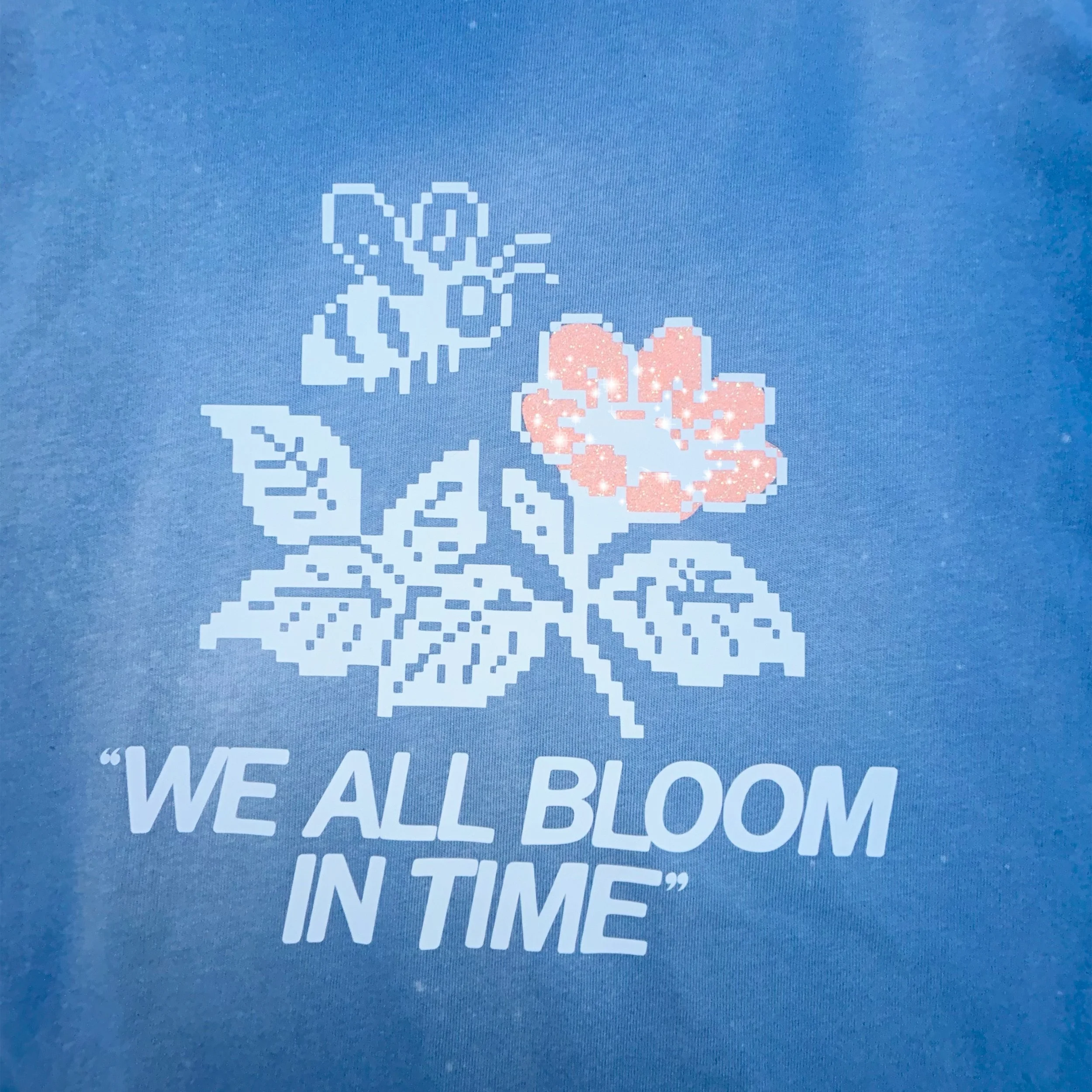 WE ALL BLOOM IN TIME TEE BLUE FRONT ZOOM REAL.jpg