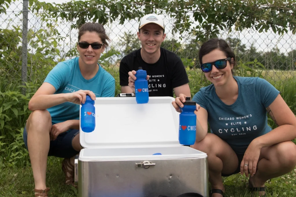 Jenny, Kevin, and Elizabeth get bottles ready for the riders