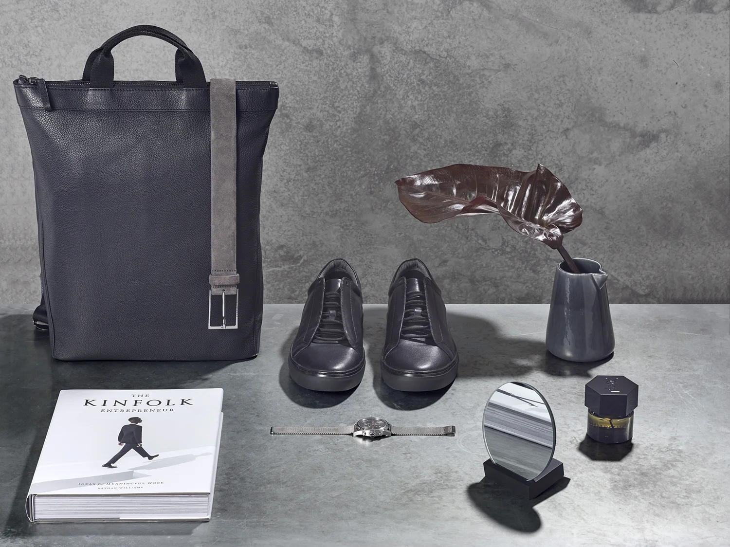 Mens accessories creative still life product photography. Product photographer Chris Howlett creates still life composition using products found at shipping centre. carefully composed products with distinctive studio lighting, created in London