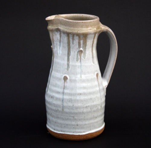  Jug with pressed pellets, 10 1/2": beech ash 'nuka' glaze with holly ash rim and holly ash runs.