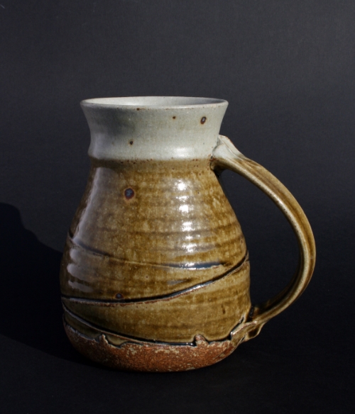 Large tankard: inside and rim down to handle ledge - soft 'eggshell' beech ash glaze; outside - oak ash based glaze.
