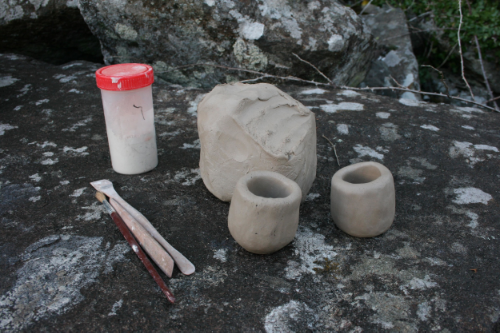 Two pinch pots.