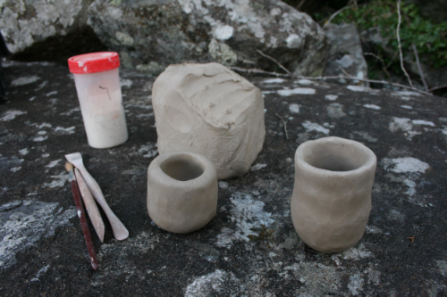 One of the pinch pots has been pulled up...