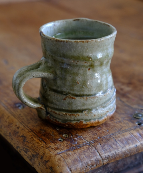 Coffee mug: oak-ash/granite & marble worktop sawdust/clay glaze.