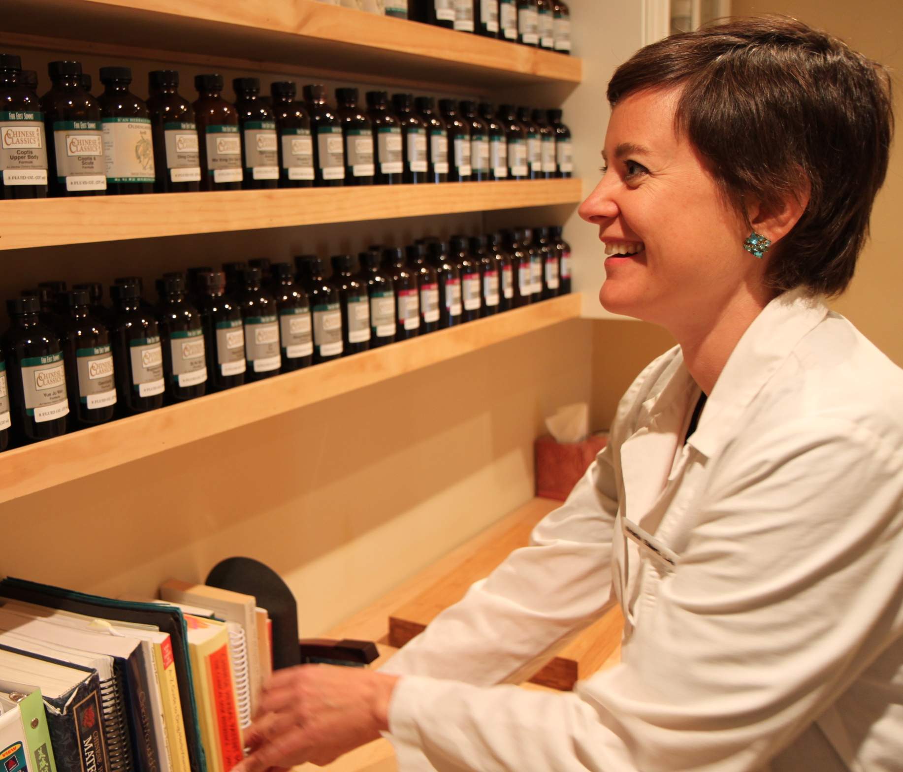 Acupuncturist Kristin Ebbert in the herbs pharmacy