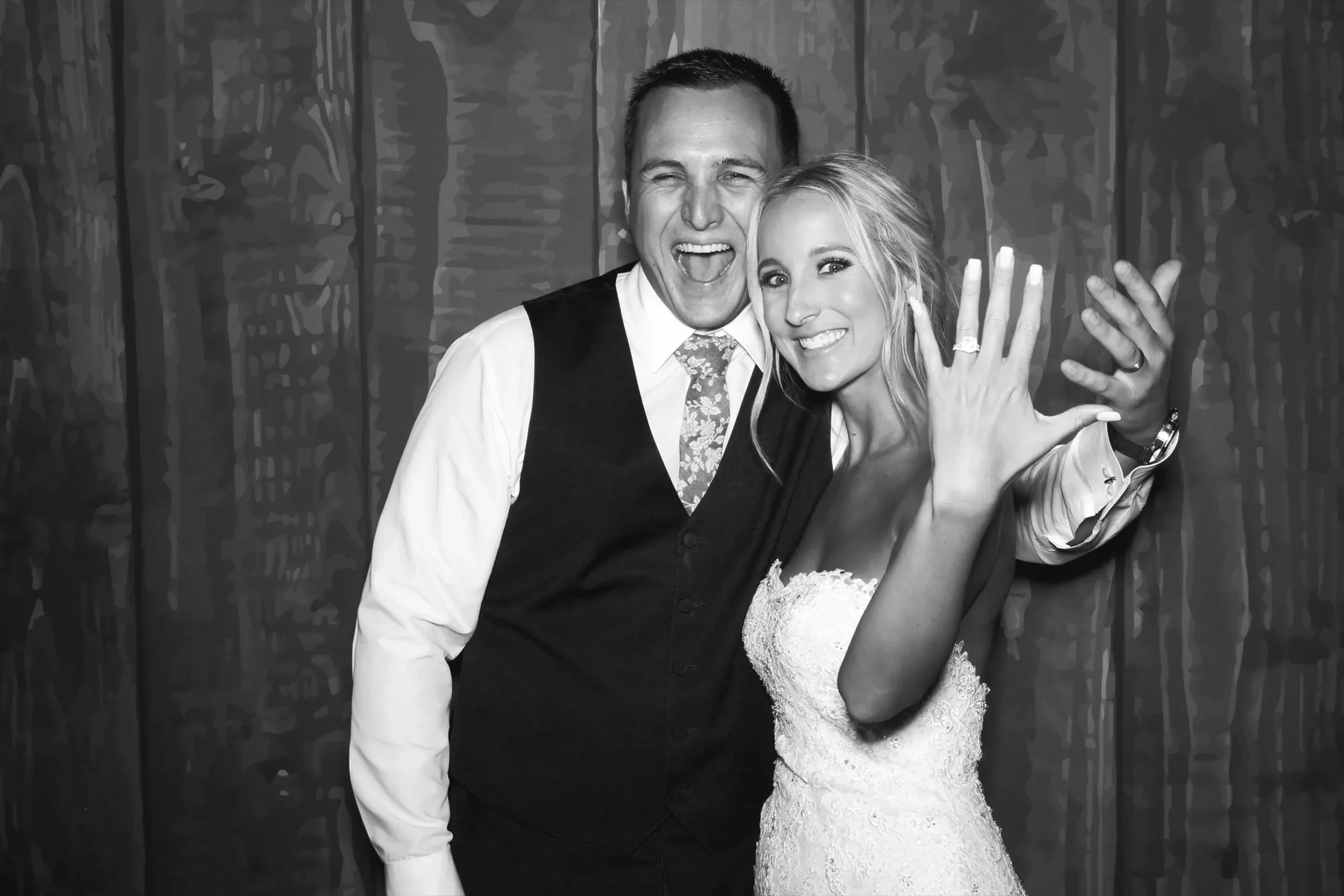 Bride and groom in the photo booth at a wedding in Orange County