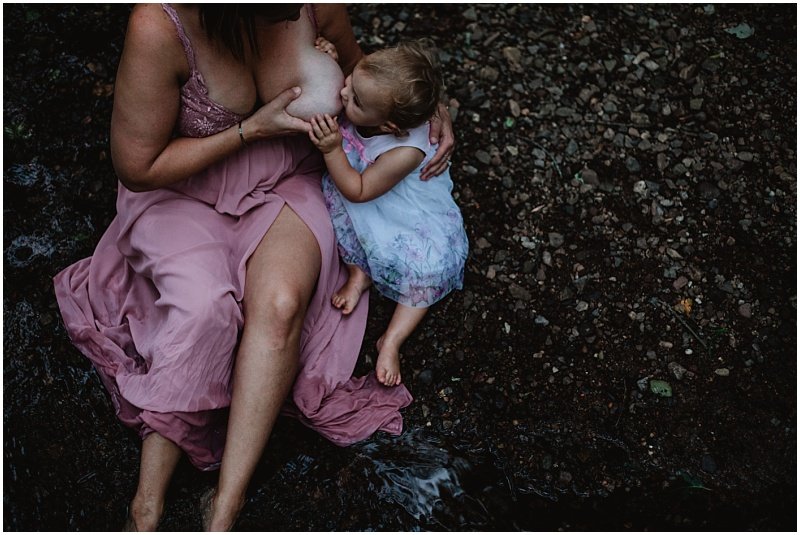 Sara Zinn Photography Breastfeeding By Creek