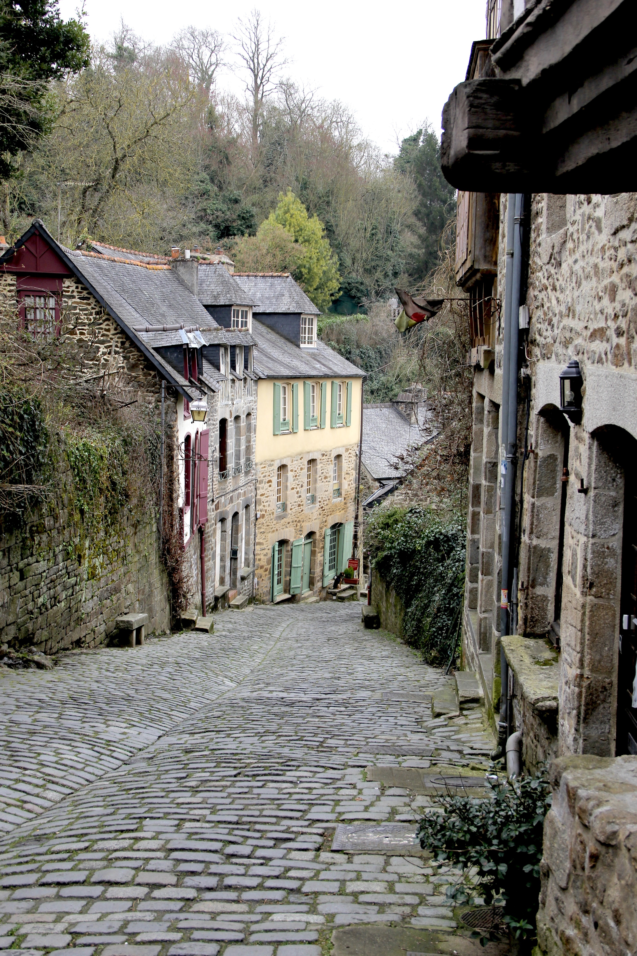 Light reflects off a home along Rue du Petit-Fort, Dinan, France