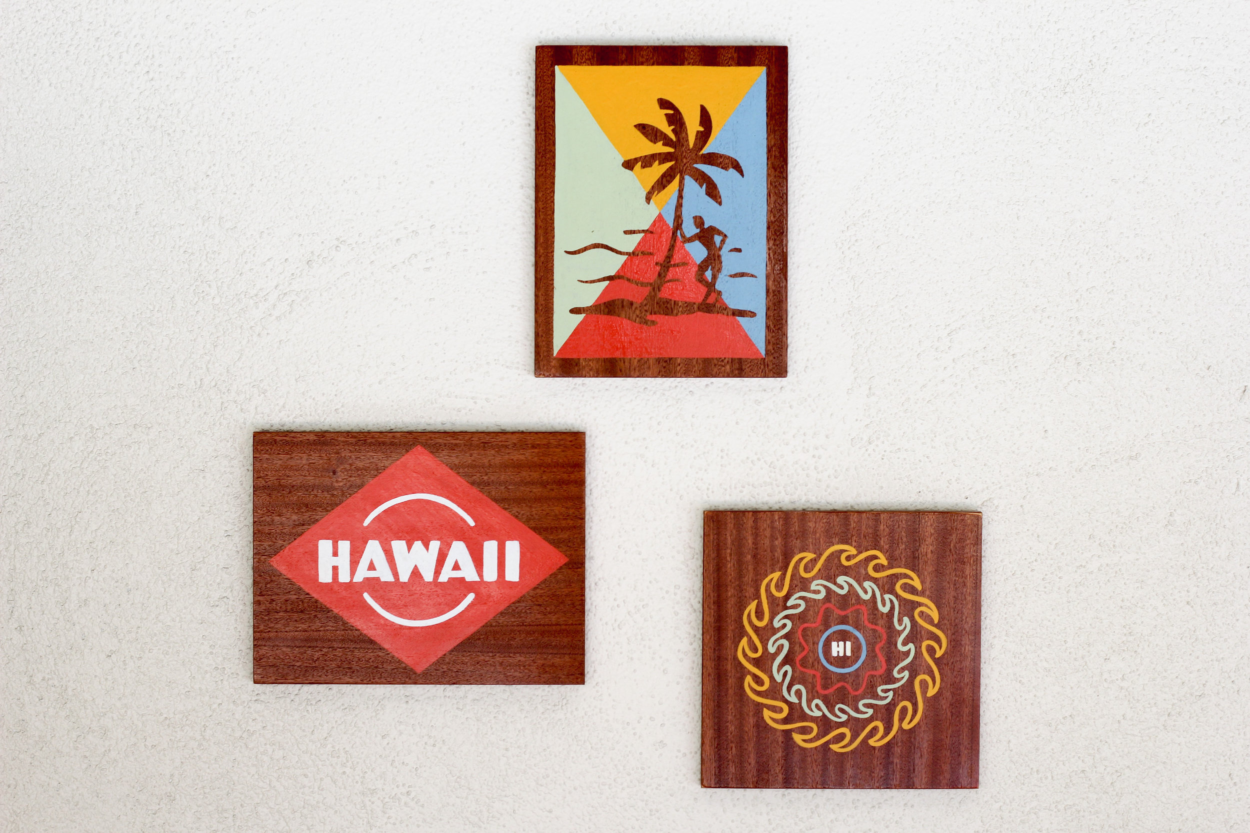 Local artists adorn the wall at the Surfjack in Honolulu