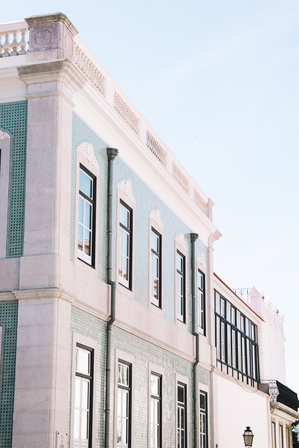 A green tiled building in Lisbon