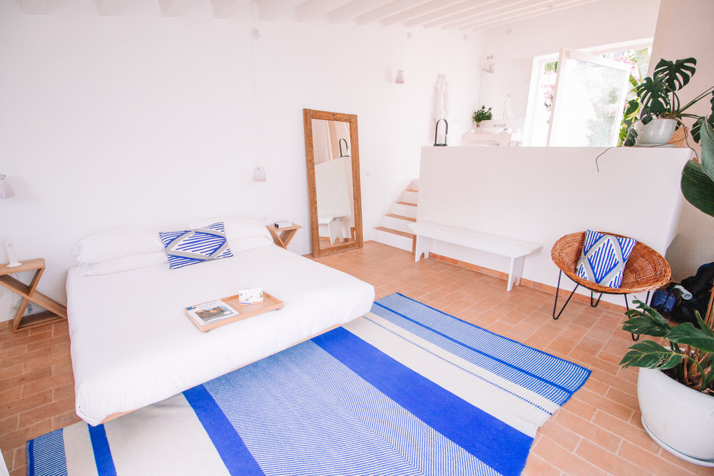 White rooms with blue accents are the signature of Casa Mae